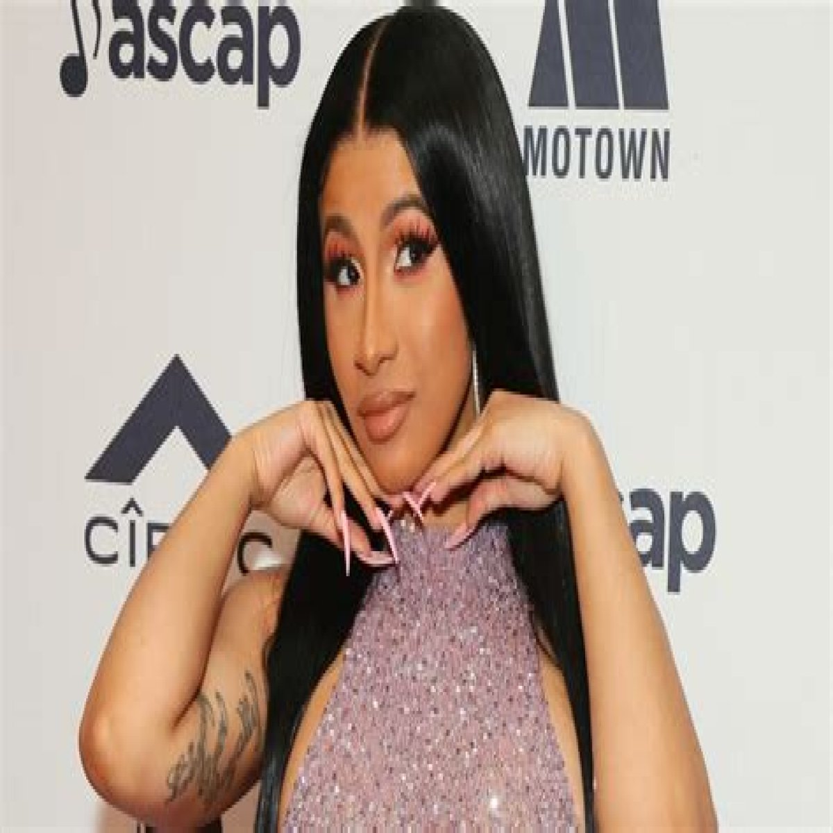 Cardi B unveils her new tattoo that starts from the top of her back to the middle of her thigh (video)