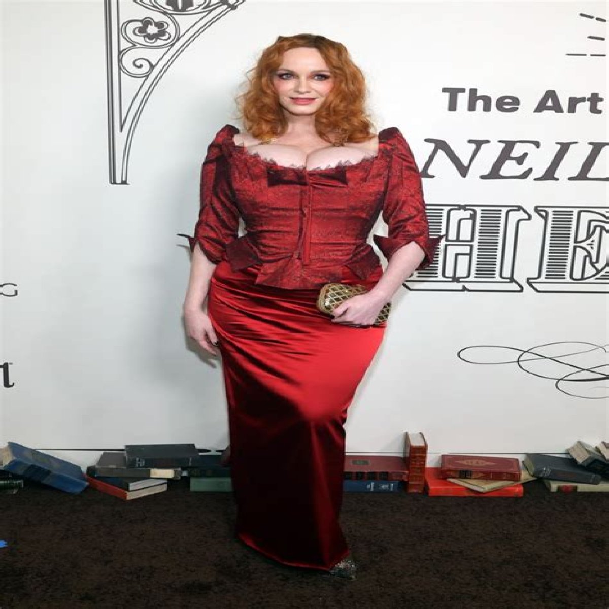 Christina Hendricks wore a corseted look & terrible makeup to the Art of Elysium gala