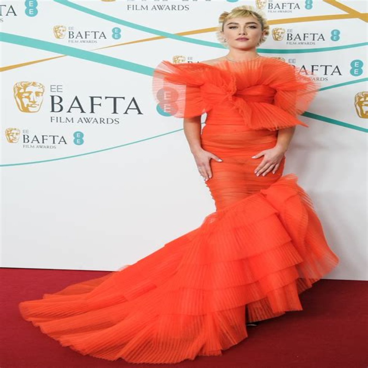 Florence Pugh wore custom Nina Ricci at the BAFTAs: orange you glad she did???