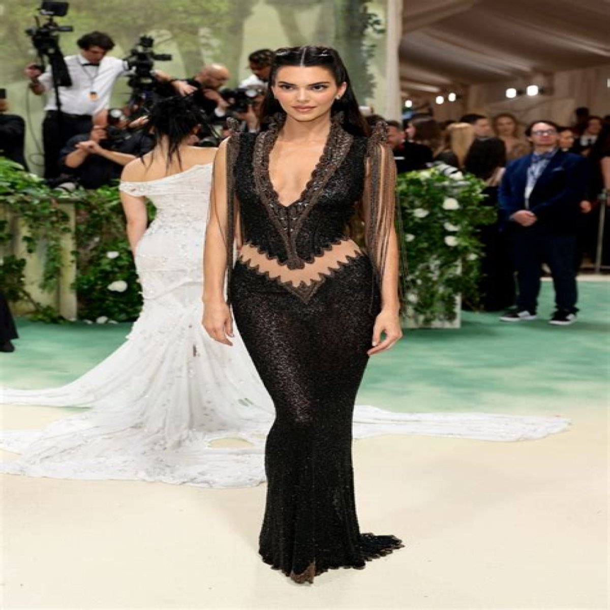 Kendall Jenner Stuns In Brown Maxi Dress With Slicked Hair Look