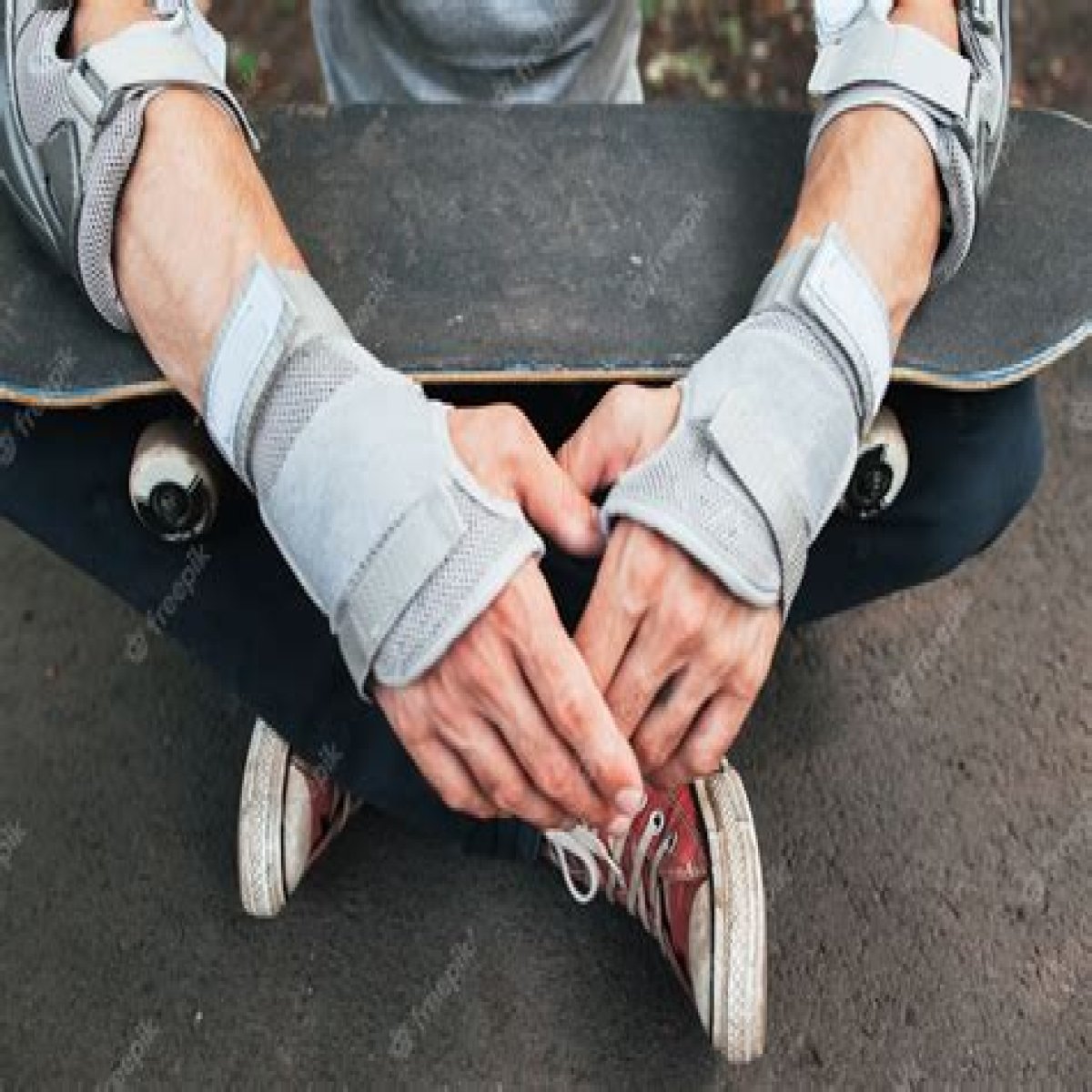 Protective items worn on a skateboarder's elbows