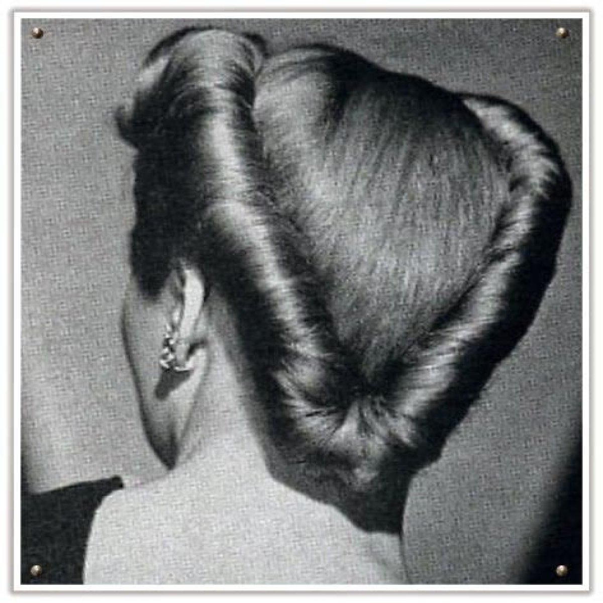 Tightly rolled hairstyle